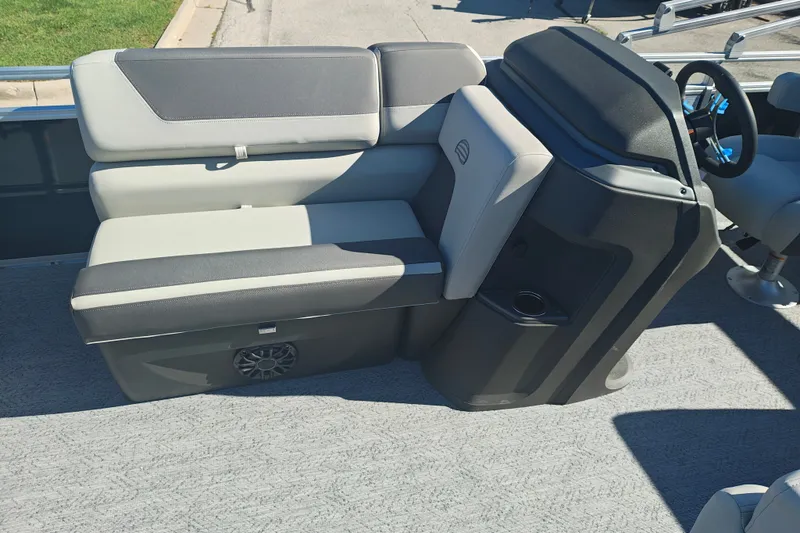 Slide: The Image of 2027 Sun Tracker Fishin' Barge 20 DLX interior seating and console detail. - 15