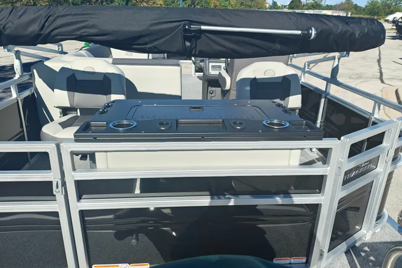 Slide: The Image of 2027 Sun Tracker Fishin' Barge 20 DLX interior with seating and fishing station. - 48
