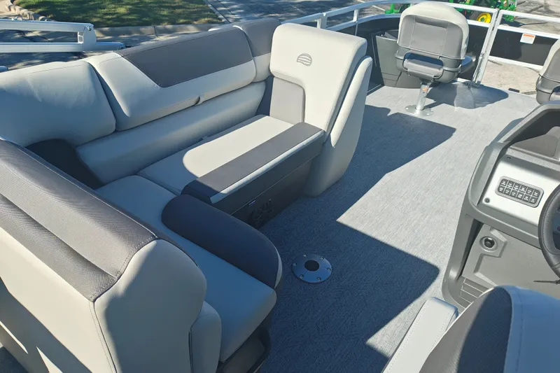 Slide: The Image of Interior of 2027 Sun Tracker Fishin' Barge 20 DLX pontoon boat with seating and console. - 53
