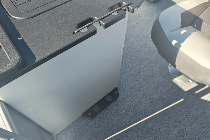 Slide: The Image of 2027 Sun Tracker Fishin' Barge 20 DLX interior with seating and console detail. - 52
