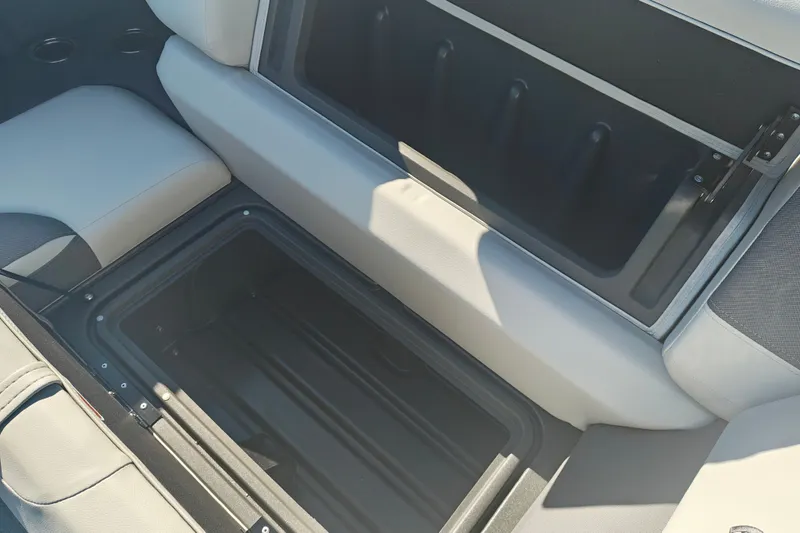 Slide: The Image of Open storage compartment on 2027 Sun Tracker Fishin' Barge 20 DLX boat. - 24
