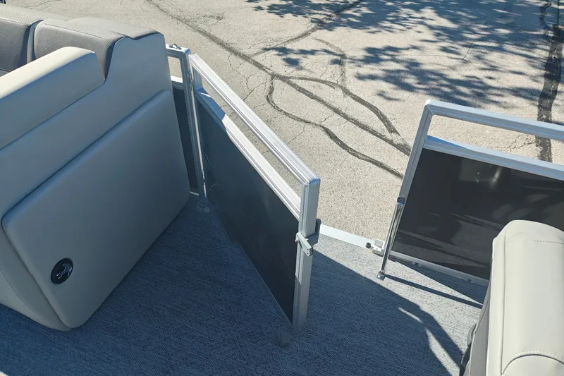 Slide: The Image of 2027 Sun Tracker Fishin' Barge 20 DLX pontoon boat with open side gate. - 21