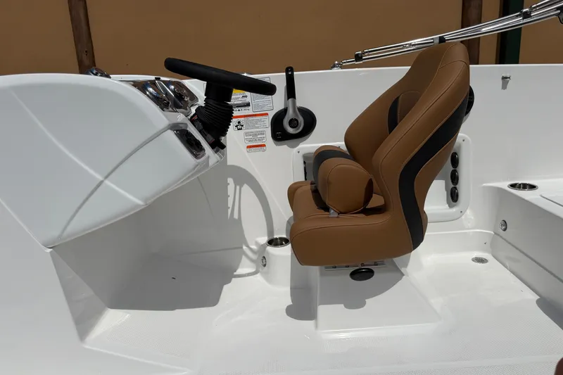 Slide: The Image of Modern Tahoe 1950 boat cockpit with brown seat and steering wheel, 2027 model. - 4