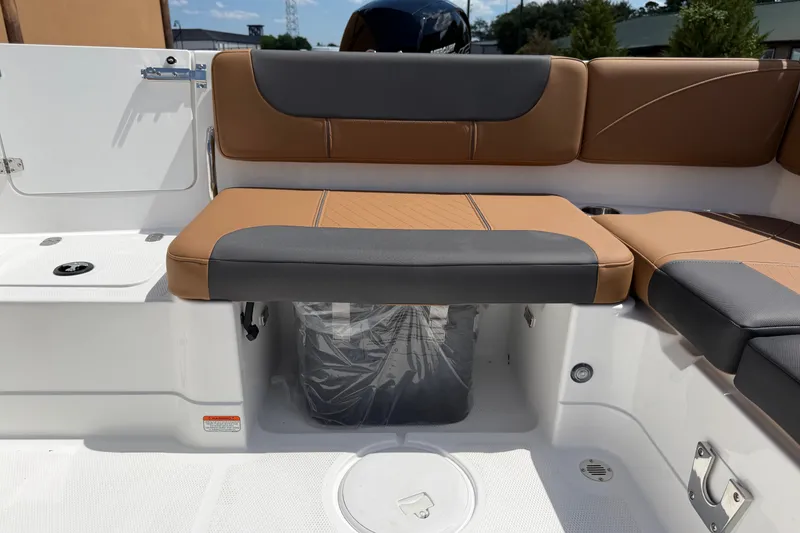 Slide: The Image of 2027 Tahoe 1950 boat interior with tan and gray seating, showcasing modern design. - 5