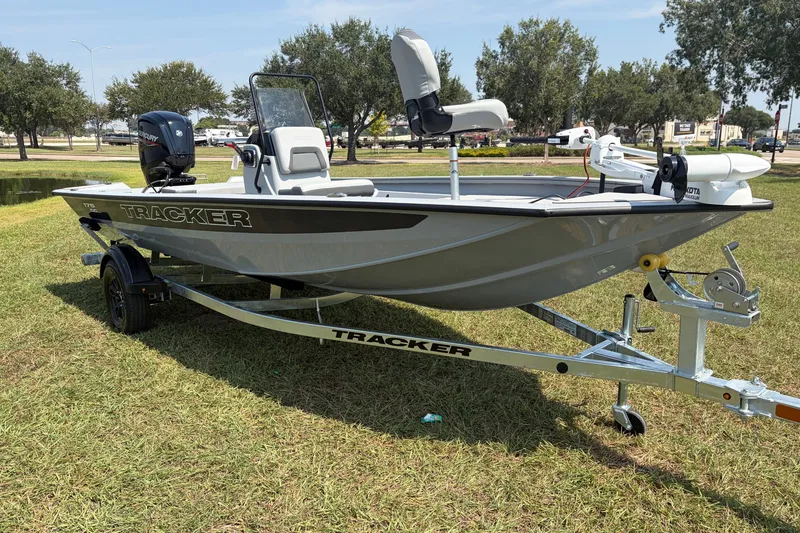 Slide: The Image of 2027 Tracker Bass Tracker 175 CC boat on trailer, parked on grass. - 40