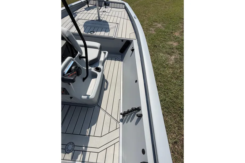 Slide: The Image of 2027 Tracker Bass Tracker 175 CC boat interior with sleek seating and modern design. - 42