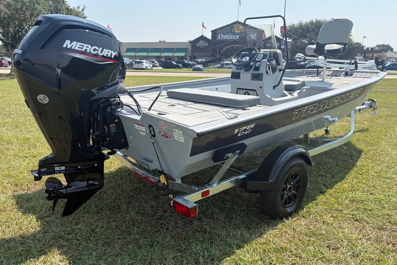 The Image of 2027 Tracker Bass Tracker 175 CC boat with Mercury engine on grassy field. - 0