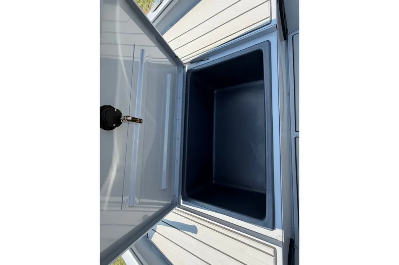 Slide: The Image of Open storage compartment on 2027 Tracker Bass Tracker 175 CC boat. - 45