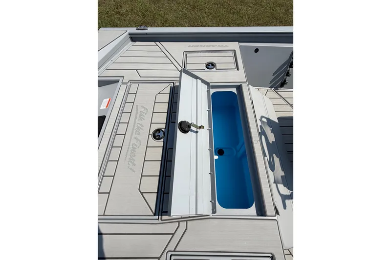 Slide: The Image of 2027 Tracker Bass Tracker 175 CC boat deck with open storage compartment. - 51