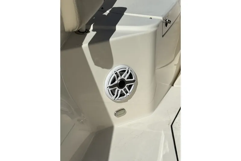 Slide: The Image of 2024 Cobia 350 Center Console boat interior with speaker detail. - 47