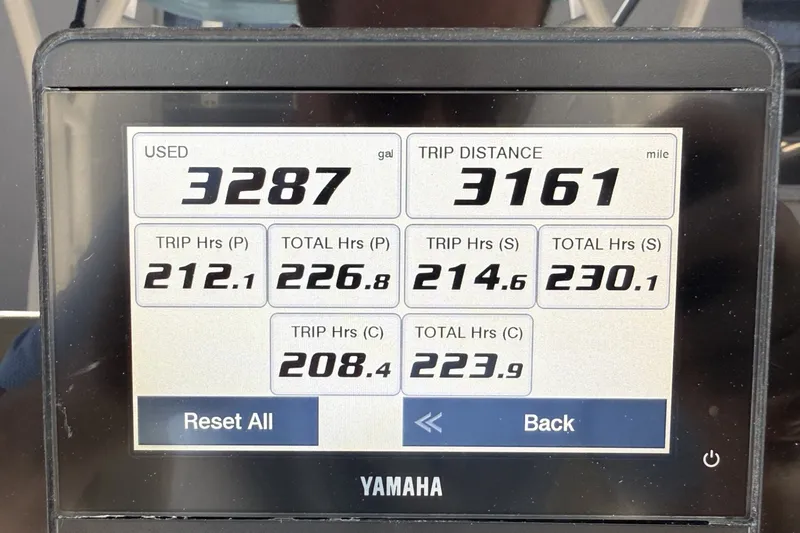 Slide: The Image of Display screen showing fuel usage and trip data for a 2024 Cobia 350 Center Console. - 24