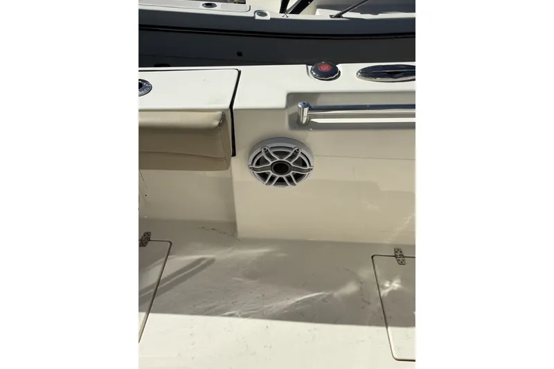 Slide: The Image of 2024 Cobia 350 Center Console boat interior with speaker and seating detail. - 46