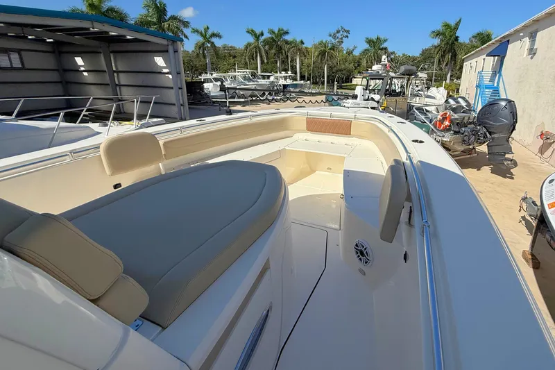Slide: The Image of 2024 Cobia 350 Center Console boat with spacious seating and modern design. - 33
