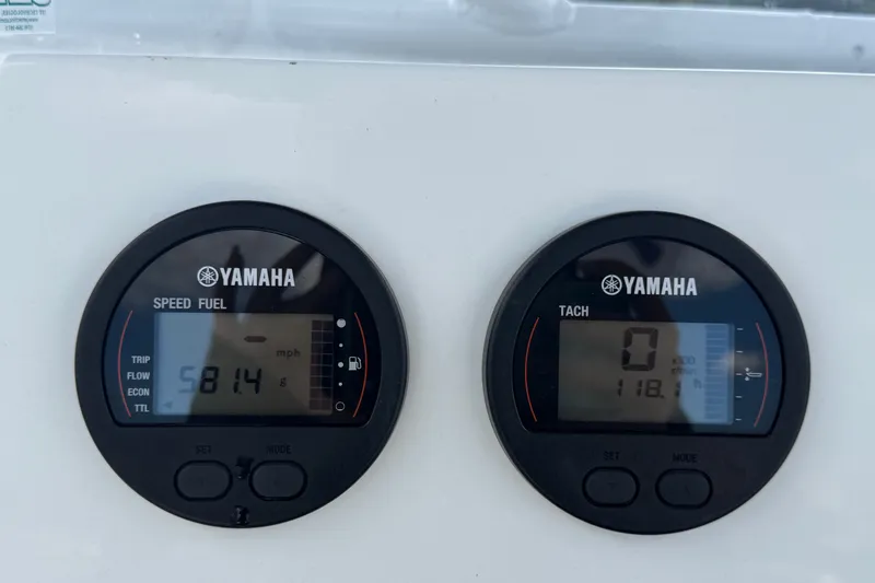 Slide: The Image of Yamaha speed and tachometer gauges on 2023 Wellcraft 202 Fisherman boat dashboard. - 17