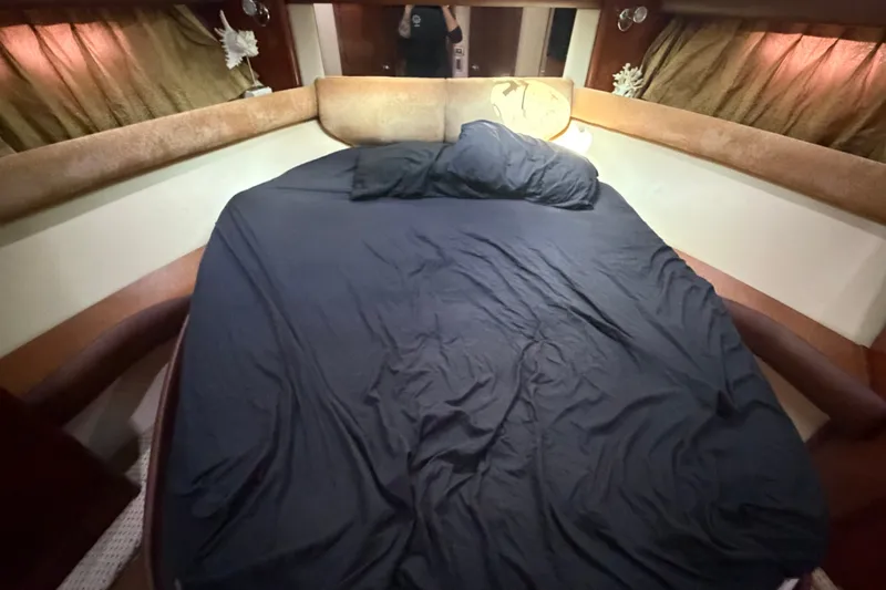 Slide: The Image of Luxurious cabin interior of 2008 Meridian 391 Sedan with cozy bedding. - 67
