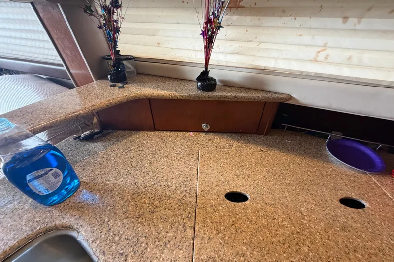 Slide: The Image of Interior of 2008 Meridian 391 Sedan with granite countertop and decorative vases. - 55