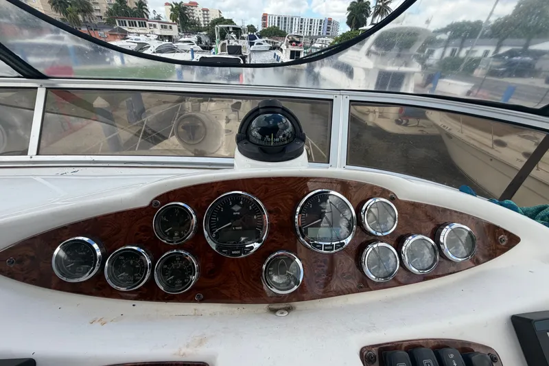 Slide: The Image of Dashboard of a 2008 Meridian 391 Sedan yacht with gauges and compass. - 15