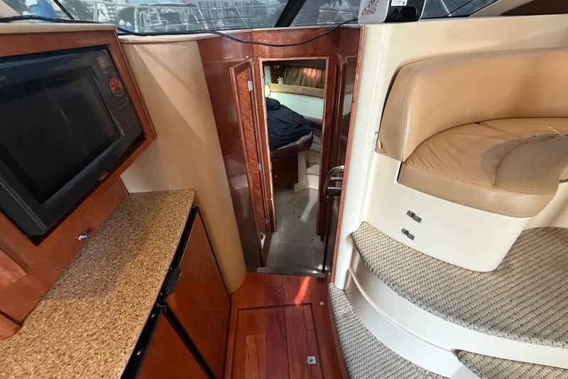 Slide: The Image of Interior of 2008 Meridian 391 Sedan yacht with kitchen and seating area. - 58