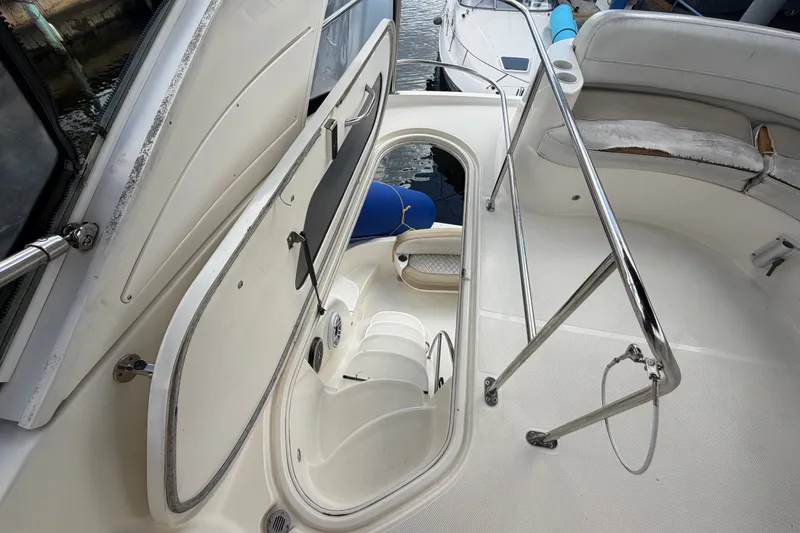 Slide: The Image of 2008 Meridian 391 Sedan yacht interior with open hatch and seating area. - 25