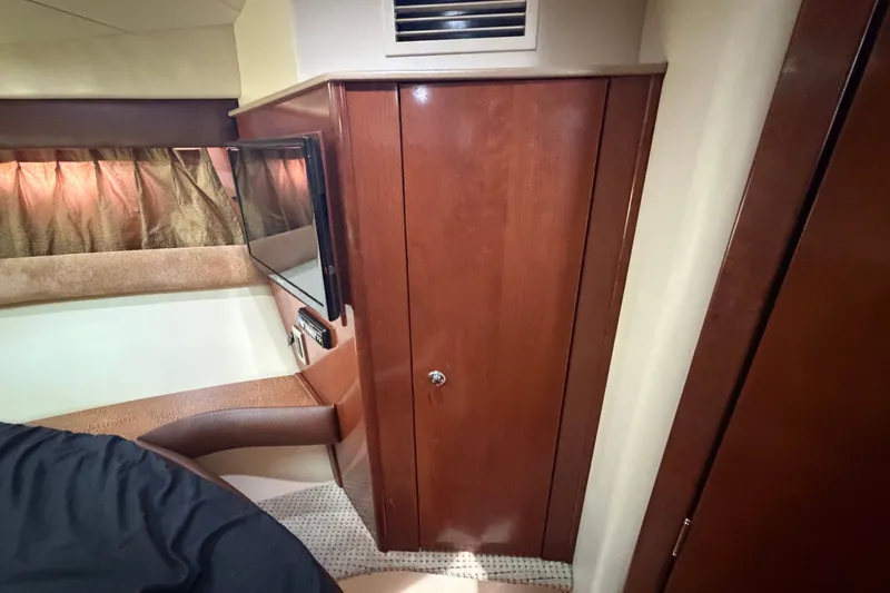 Slide: The Image of Interior of 2008 Meridian 391 Sedan with wood paneling and mounted TV. - 71