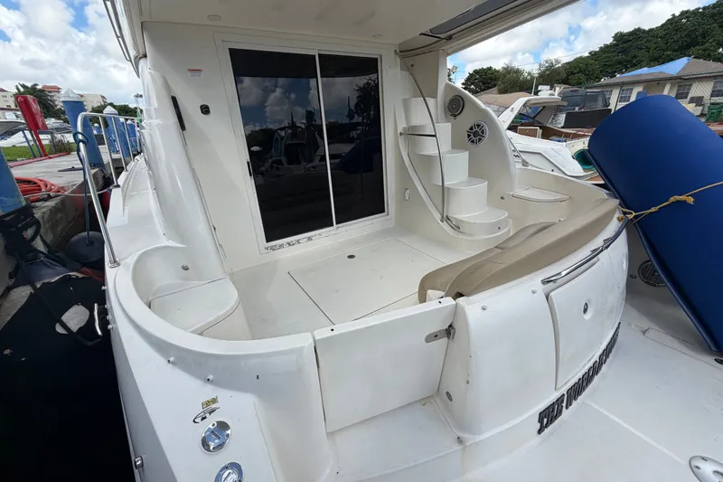 Slide: The Image of 2008 Meridian 391 Sedan yacht with spacious deck and elegant spiral staircase. - 31