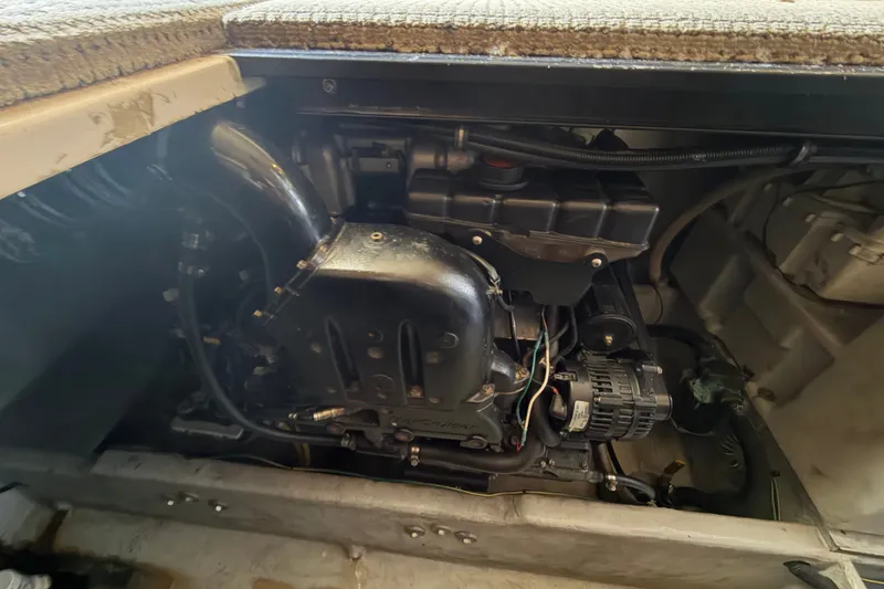 Slide: The Image of Engine compartment of a 2008 Meridian 391 Sedan boat, showcasing mechanical components. - 78