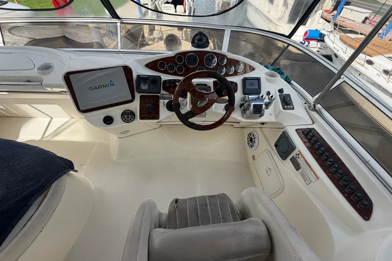 Slide: The Image of Cockpit of 2008 Meridian 391 Sedan with Garmin navigation system and control panel. - 11