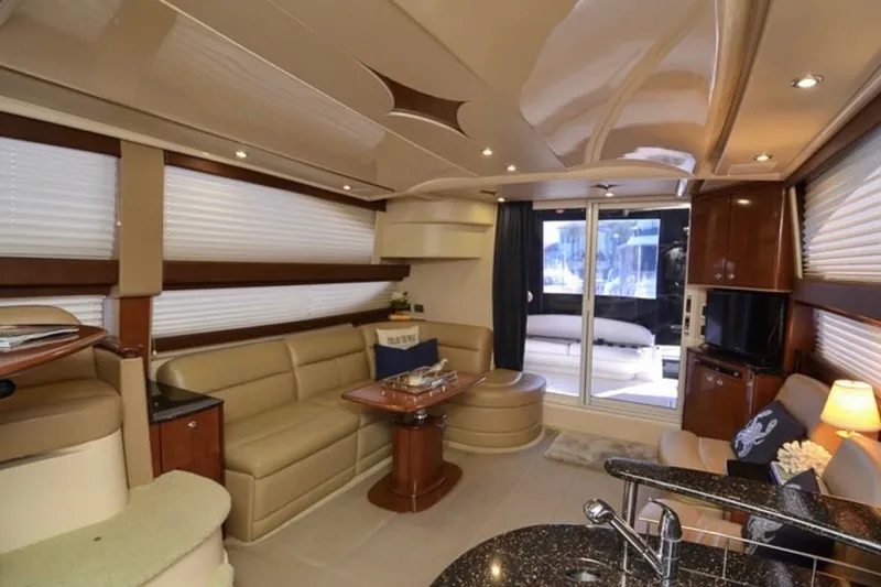 Slide: The Image of Luxurious interior of a 2008 Meridian 391 Sedan yacht with elegant seating and modern amenities. - 5