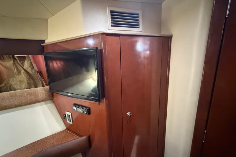 Slide: The Image of Interior of 2008 Meridian 391 Sedan with TV and wooden cabinetry. - 68