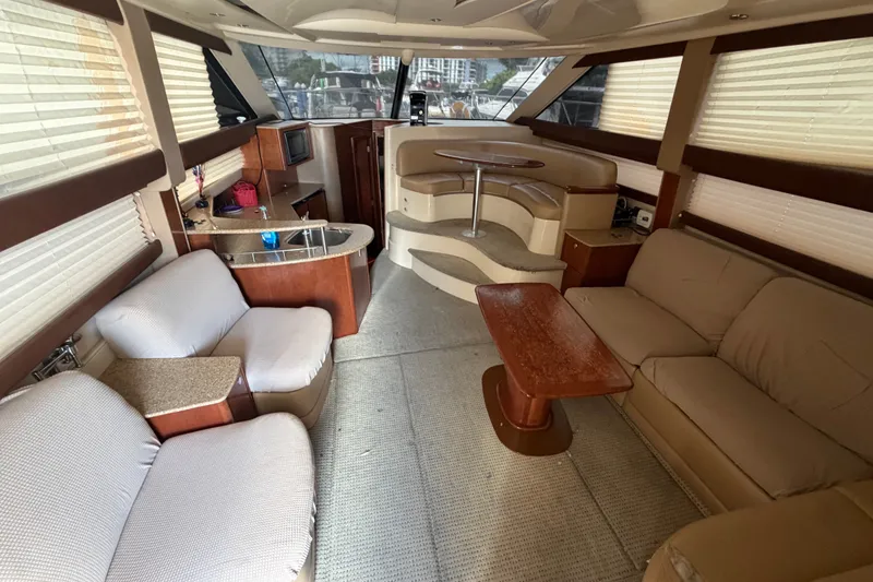 Slide: The Image of Luxurious interior of a 2008 Meridian 391 Sedan yacht with plush seating and modern amenities. - 39