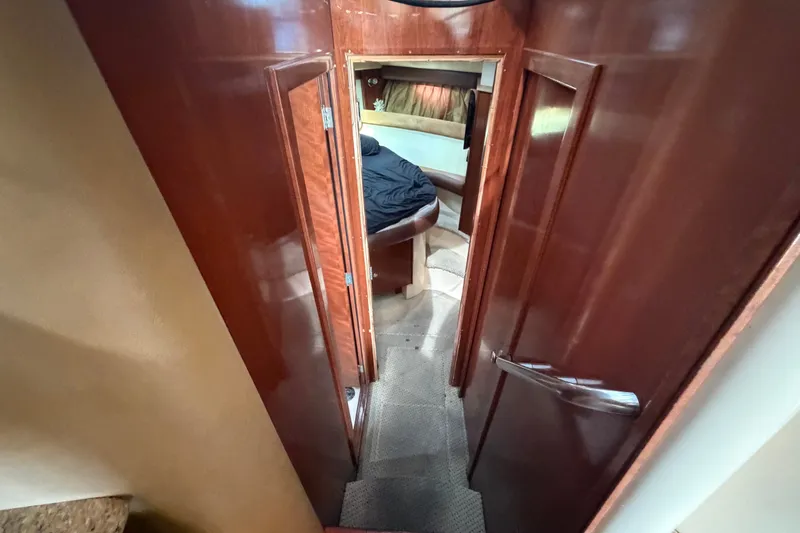 Slide: The Image of Interior view of 2008 Meridian 391 Sedan yacht cabin with wooden finishes. - 59