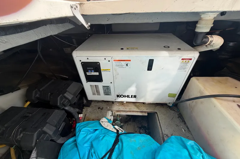 Slide: The Image of Kohler generator in 2008 Meridian 391 Sedan engine compartment. - 89