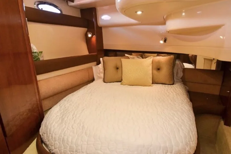 Slide: The Image of Luxurious bedroom interior of 2008 Meridian 391 Sedan yacht with elegant bedding. - 9