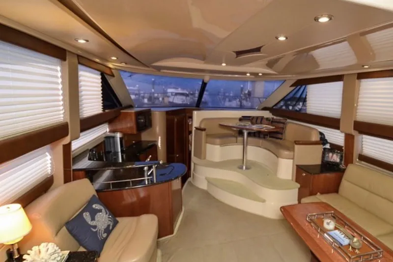 Slide: The Image of Luxurious interior of a 2008 Meridian 391 Sedan yacht with elegant seating and modern amenities. - 6