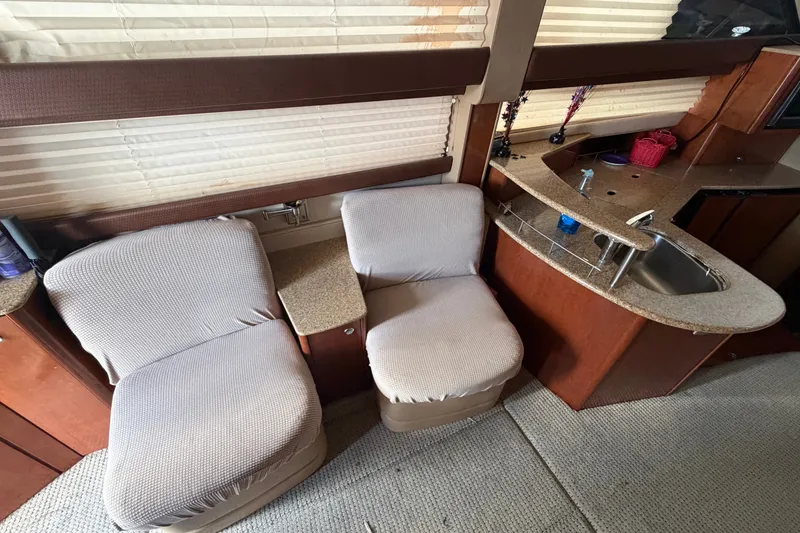 Slide: The Image of Interior of 2008 Meridian 391 Sedan with cozy seating and kitchenette area. - 43