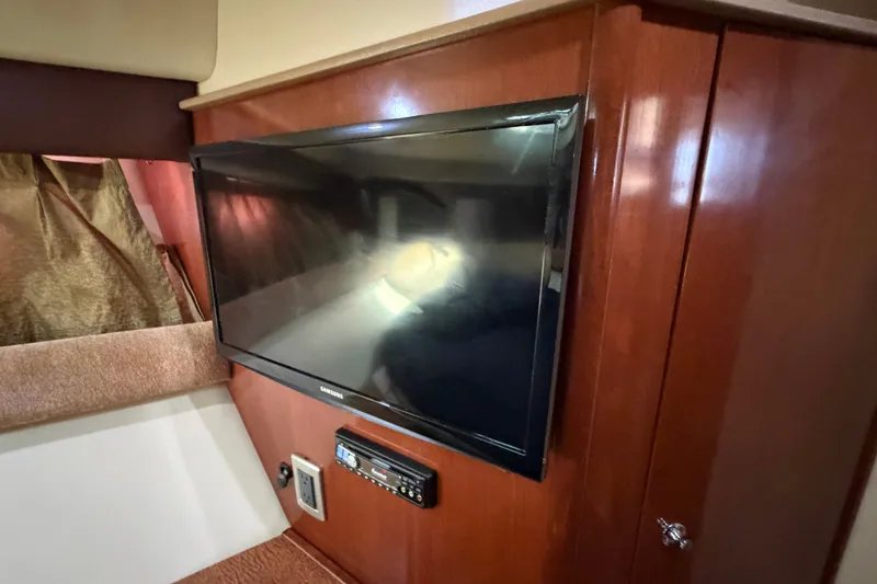 Slide: The Image of Flat-screen TV and entertainment system in 2008 Meridian 391 Sedan yacht interior. - 69