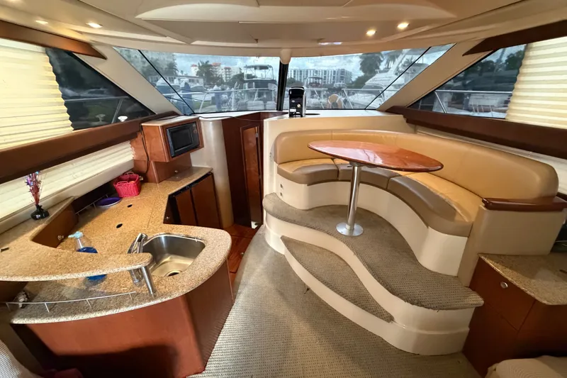 Slide: The Image of Interior of 2008 Meridian 391 Sedan yacht with kitchen and dining area. - 45