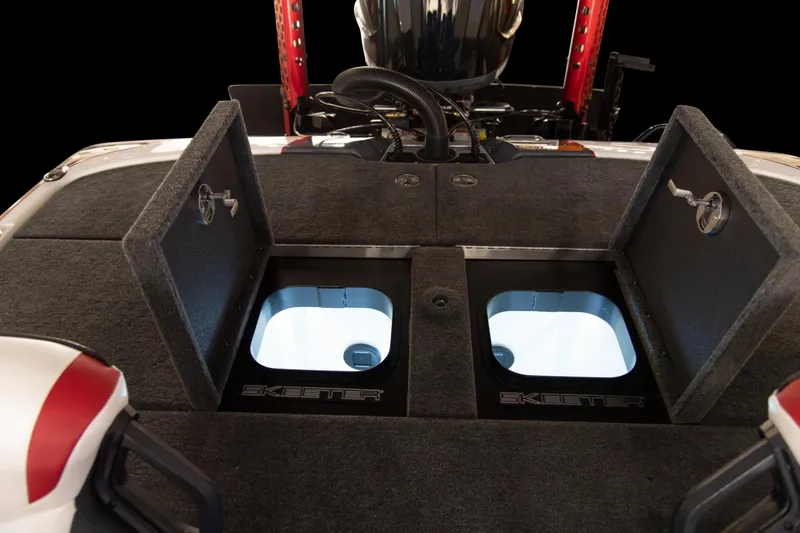 Slide: The Image of Manufacturer Provided Image: 2024 Skeeter FXR21 Apex boat storage compartments with open lids, showcasing interior design. - 19