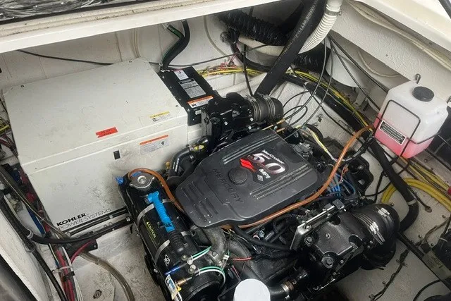 Slide: The Image of Engine compartment of a 2006 Maxum 3300 SE boat with Kohler power system. - 22