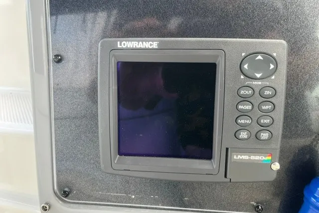 Slide: The Image of Lowrance LMS-520C marine GPS on 2006 Maxum 3300 SE boat dashboard. - 11