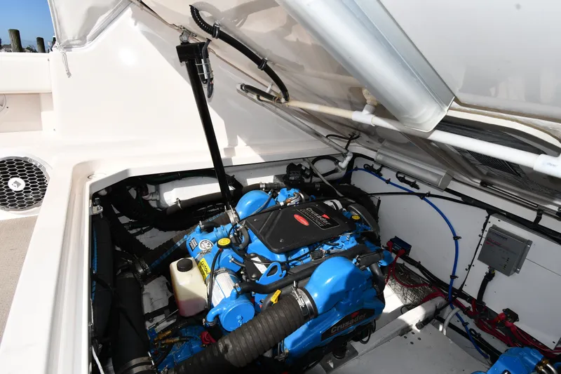 Slide: The Image of Engine compartment of a 2004 Tiara Yachts 3500 Open, featuring a Crusader engine. - 48