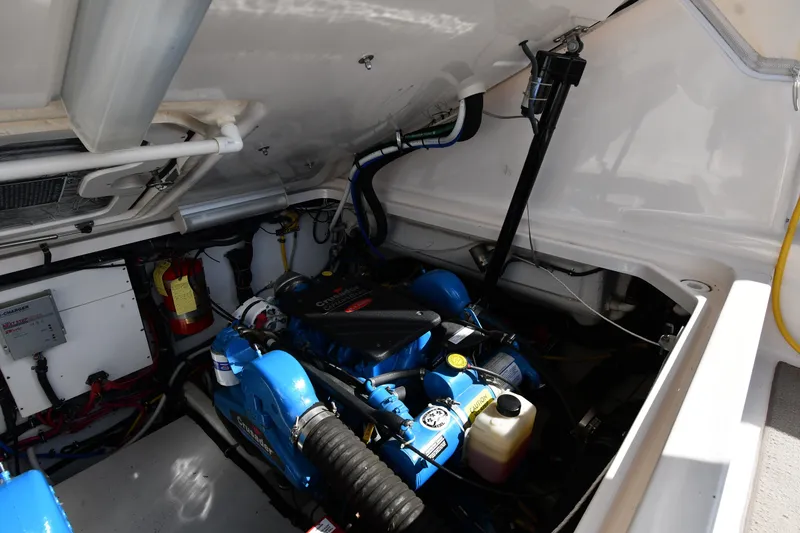 Slide: The Image of Engine compartment of a 2004 Tiara Yachts 3500 Open, featuring a Crusader engine. - 47