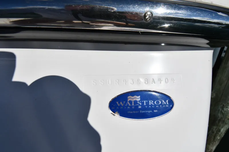 Slide: The Image of 2004 Tiara Yachts 3500 Open with Walstrom Marine Yachting emblem. - 20
