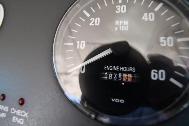Slide: The Image of Close-up of Tiara Yachts 3500 Open 2004 tachometer showing engine hours. - 13