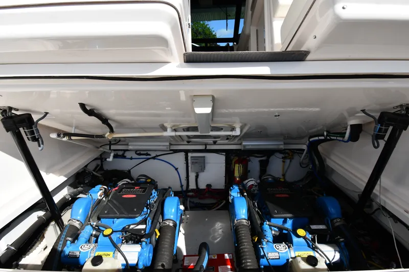 Slide: The Image of Engine compartment of a 2004 Tiara Yachts 3500 Open, featuring dual Crusader engines. - 45