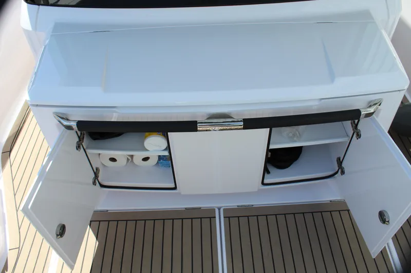 Slide: The Image of Storage compartment on 2022 Axopar 37 XC Cross Cabin Brabus boat. - 25