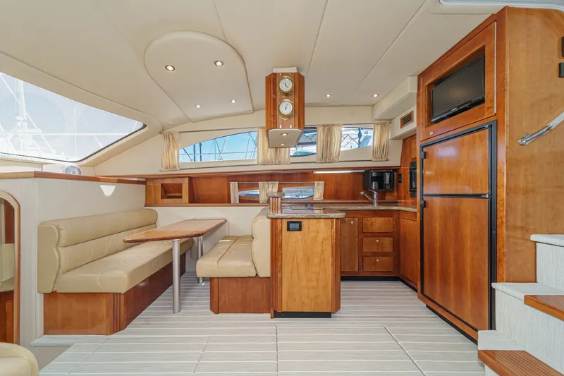 Slide: The Image of Luxurious interior of 2008 Cruisers Yachts 415 Express Motoryacht with elegant wood finishes. - 39