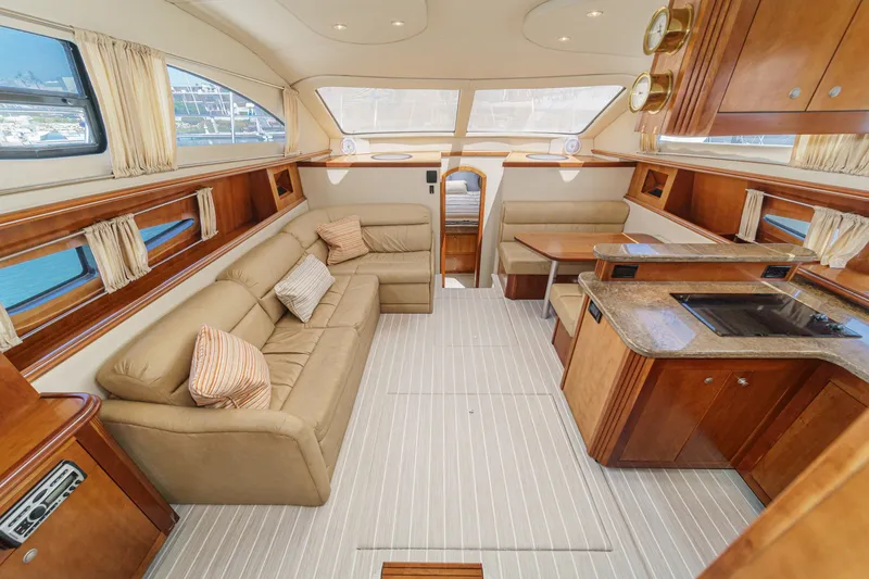 Slide: The Image of Luxurious interior of 2008 Cruisers Yachts 415 Express Motoryacht with elegant seating and kitchen area. - 37