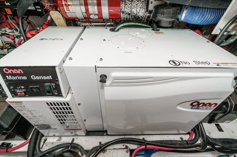 Slide: The Image of Onan marine generator in 2008 Cruisers Yachts 415 Express Motoryacht engine room. - 63