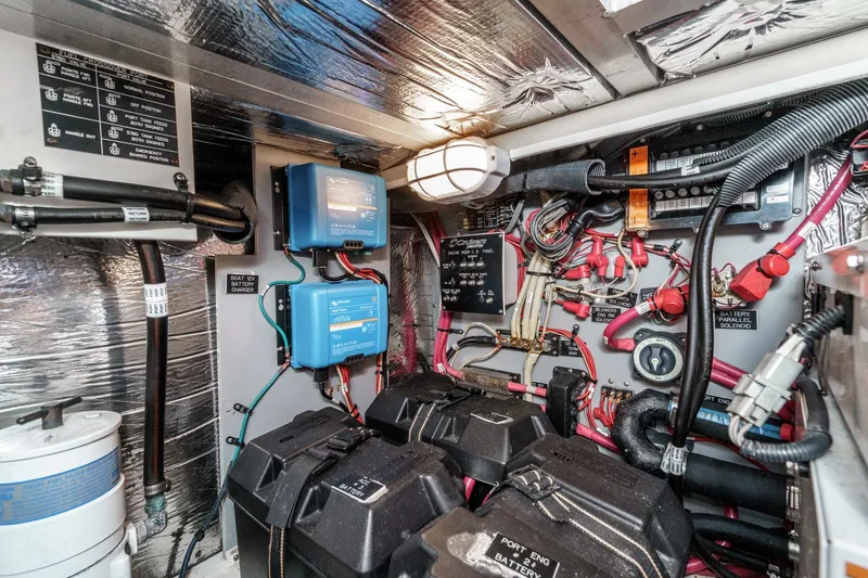 Slide: The Image of Engine room of 2008 Cruisers Yachts 415 Express Motoryacht with wiring and battery systems. - 67